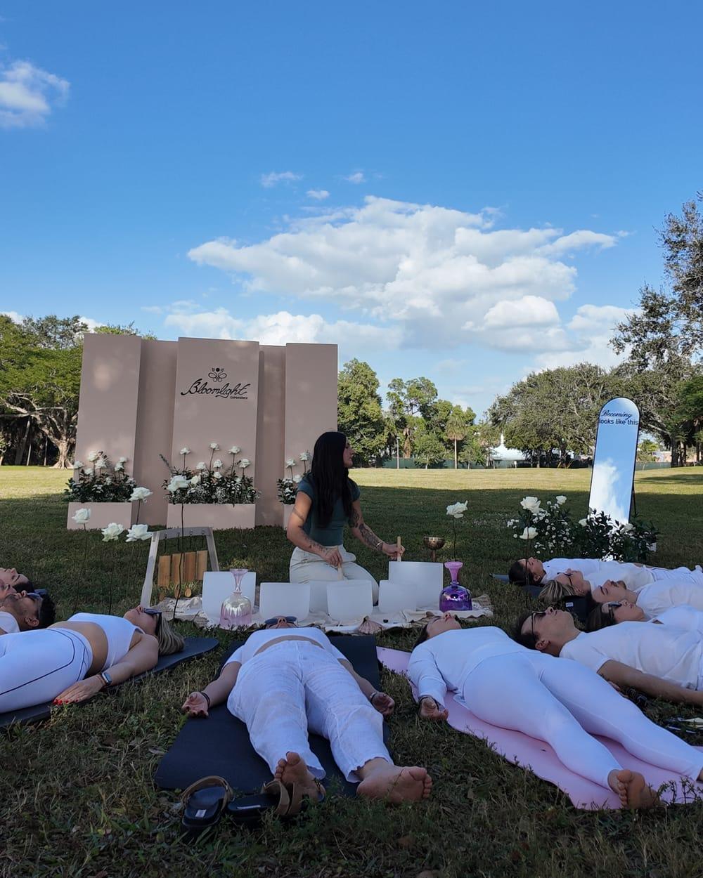 Sound healing session outdoors at a Bloomlight event in Miami
