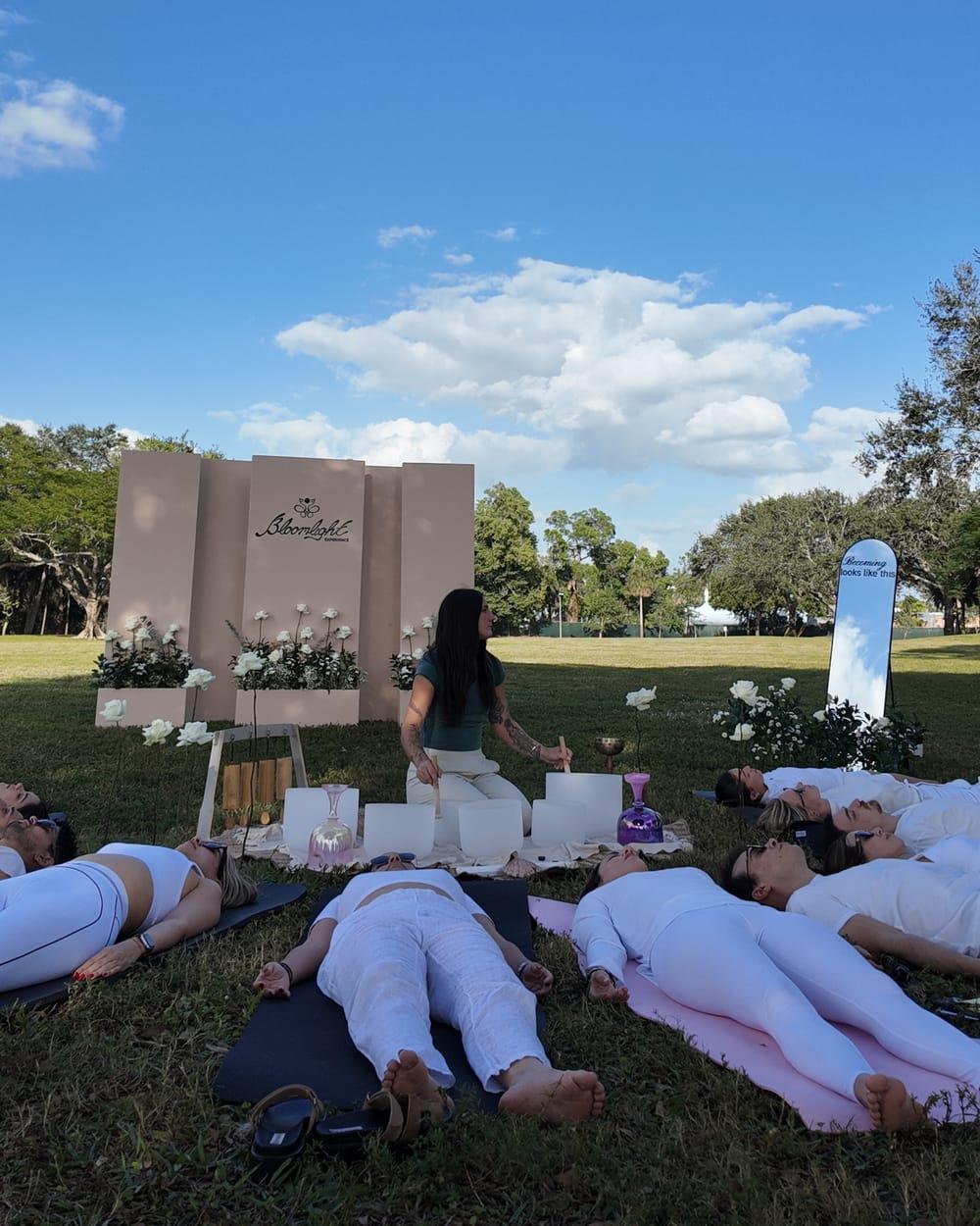Sound healing session outdoors at a Bloomlight event in Miami