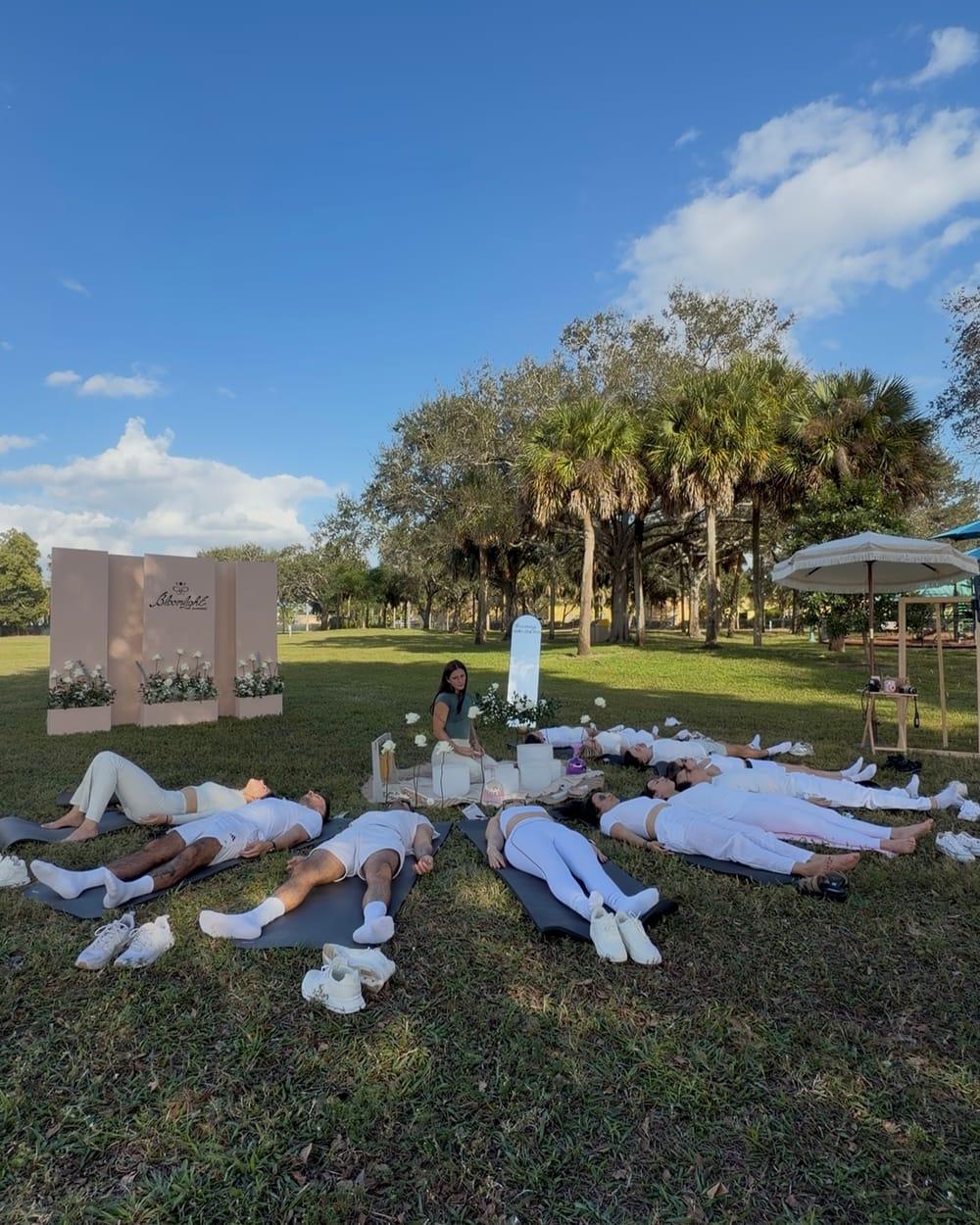 Sound healing session outdoors at a Bloomlight event in Miami